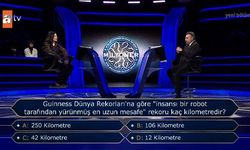 Guinness Dünya Rekorları'na göre 'insansı bir robot tarafından yürünmüş en uzun mesafe' rekoru kaç kilometredir?